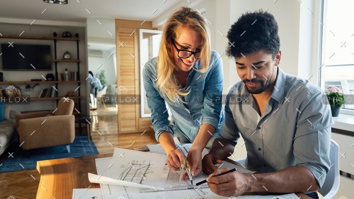 demo-attachment-466-architect-colleagues-working-in-office-HMYR4KD